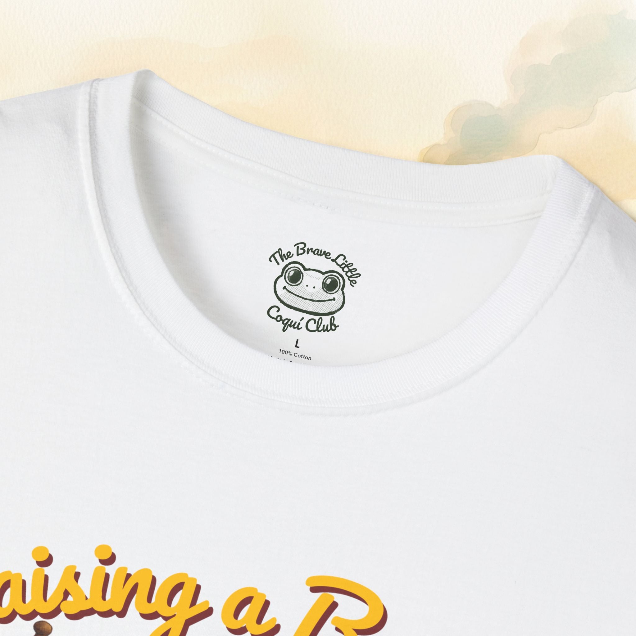 Raising a Brave Little Coquí Tee